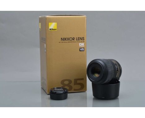 A Nikon DX AF-S Micro Nikkor 85mm f/3.5G ED VR Lens, auto focusing working, barrel VG, elements VG, with front & rear caps, H