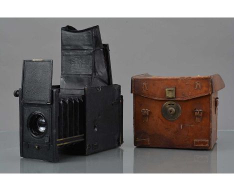 An Adams & Co. Minex De Luxe Model Reflex Camera, shutter cocks & fires, curtain sticking, body G, light wear, viewing hood G