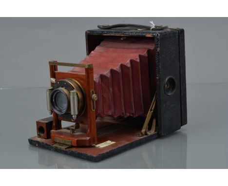 A Rochester Optical Pony Premo No 3 4 x 5'' Folding Bed Camera, shutter working, body F, missing locking nut front L/H side, 