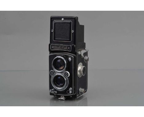 A Rolleiflex Automat MX Sync TLR Camera, serial no 1414693, shutter not cocking, body G, missing latch pin for film door, wit