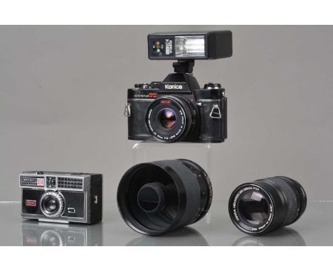 A Konica TC  Autoflex Camera, shutter working, meter unresponsive, body F-G, some wear, with AR 40mm f/1.8 & AR 135mm f/3.5 l