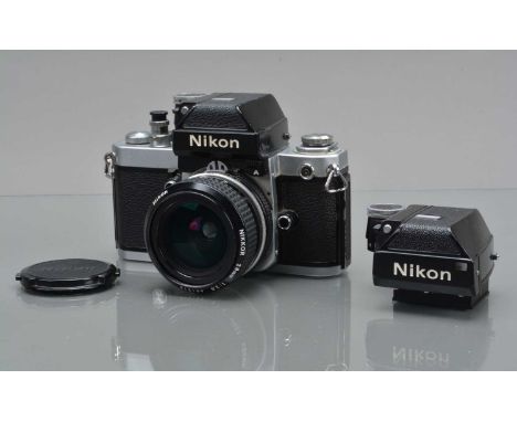 A Nikon F2 Photomic SLR Camera, chrome, serial no 8041076, shutter working, self timer working, body G, with DP-11 Photomic A