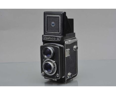 A Yashica A TLR Camera, serial no A 10510195, shutter working, body G, light wear, with Yashicor 80mm f/3.5 lens, elements F-