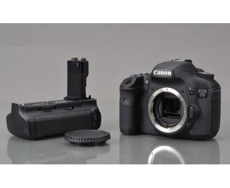 A Canon EOS 7D DSLR Camera Body, shutter working, flash working, self timer working, body G-VG, with battery, charger, body c