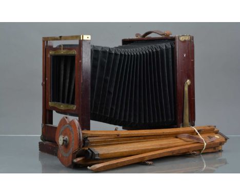 A Kodak Whole Plate Camera Body, body G, bellows G, focus screen intact,  with a Thorton Pickard wooden tripod