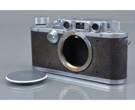 A Leitz Wetzlar Leica IIIb Model G Rangefinder Camera body, serial no 265223, 1937, shutter working, body G, brassing to moun