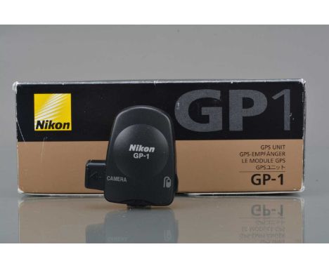 A Nikon GP-1 GPS Unit, untested, VG, with CA10 & CA90 cables, CL1 strap adapter, manual, in maker's box