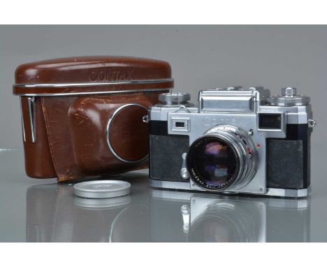 A Zeiss Ikon IIIa Rangefinder Camera, coloured dial, serial no L76484, shutter sluggish in slow speeds, meter responsive, sel