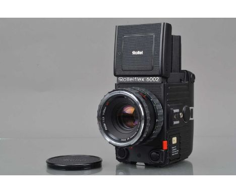 A Rolleiflex 6002 Medium Format Camera, serial no 208480024, shutter working, body G, slight wear, with Rollei HFT 80mm f/2.8