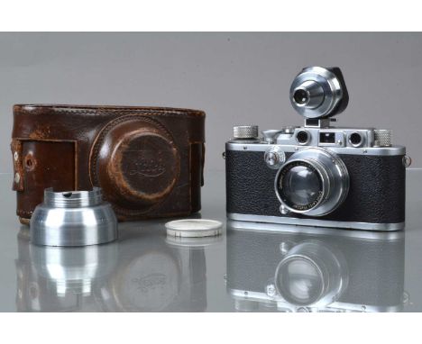 A Leitz Wetzlar Leica IIIb Model G Rangefinder Camera, serial no 283342, 1930, shutter working, body F-G, brassing to shutter