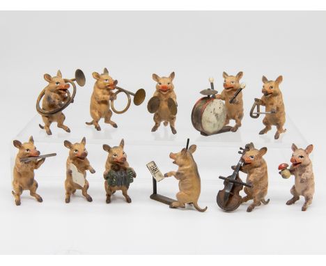 Wiener Bronze, 10-teiliges Schweine-Orchester plus Glücksschwein, Österreich, 1. Hälfte 20. Jh. Bronze, polychrom naturalisti