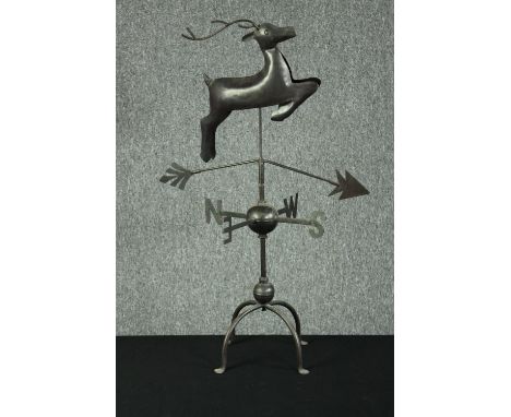 A weather vane in the shape of a stag. H.80 cm. 
