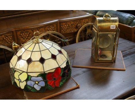 Tiffany style shade and a brass lamp