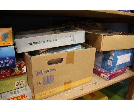 Shelf of assorted board games