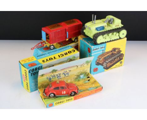 Three boxed Corgi diecast models showing play wear to include 256 Volkswagen 1200 in East African Safari trim, no figure, Maj