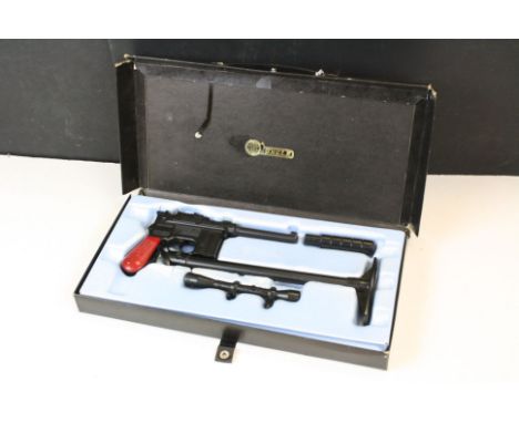 The Man From UNCLE gun and sight set, complete, hammer action has been damaged 