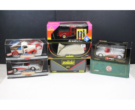 Six boxed diecast models to include American Muscle 1970 Boss Mustang, 1967 Corvette L-71, Solido Cadillac Eldorado 1955, Rol