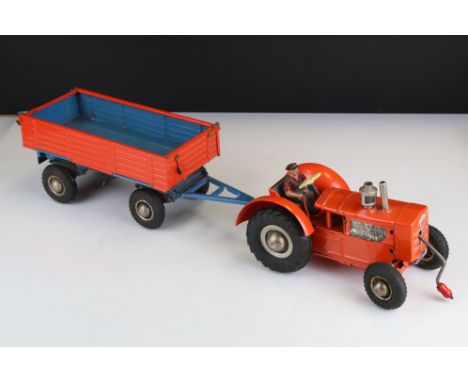 Mid 20th C Gama tin plate clockwork tractor with trailer, clockwork key needing repair, some paint loss, gd overall 