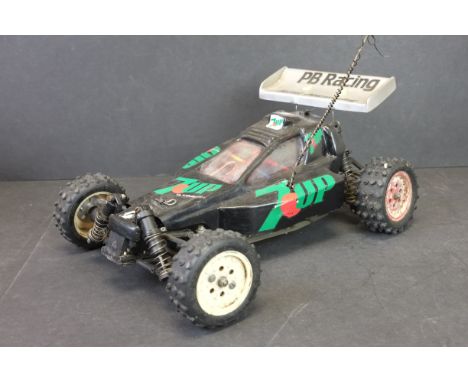 A PB Racing Mini Mustang 1/10 scale electric remote control buggy, 4WD c.1980's. 