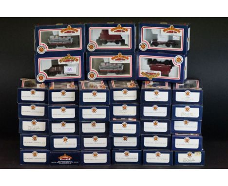 36 Boxed Bachmann OO gauge items of rolling stock featuring wagons, vans and containers to include 33326 Conflat with BD Cont
