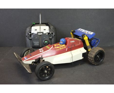 A Tamiya Striker 58061 1/10 scale electric RC buggy, 2WD c.1987 plastic tub &amp; body together with Futuba attack RC Control