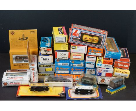 34 Boxed HO gauge items of rolling stock to include Bachmann, Roco, Piko, Marklin, Rivarossi etc