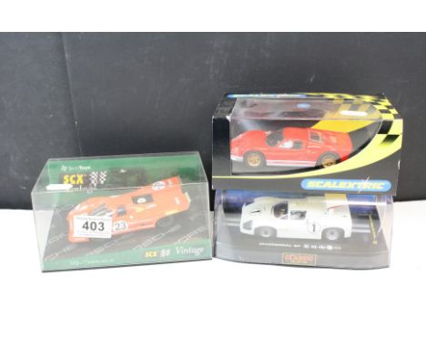 Three cased slot cars to include Scalextric Classic Car Collection Chaparral 2F, Scalextric C2424 Ford GT40 mkII Collectors C