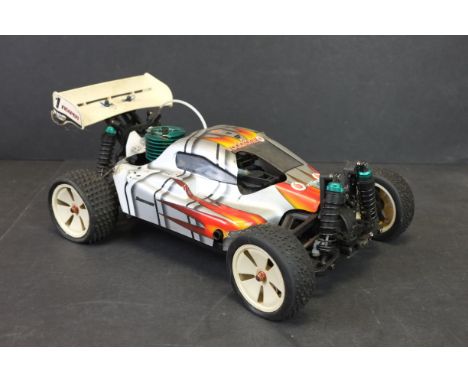 A Ansmann racing Reaper 1/10 scale Nitro remote control buggy, 4WD c.2007, complete with Ansmann 15 intro engine and original