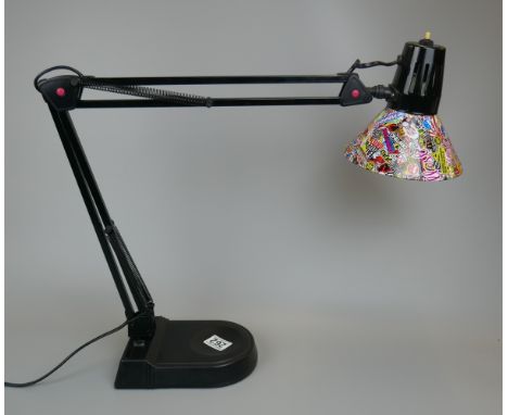 Angle poise style lamp with retro sticker bomb shade