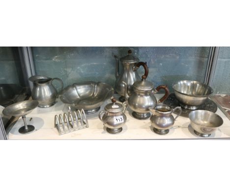 Shelf of metalware