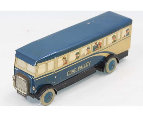 Chad Valley CV10005 Circa 1945, tinplate and clockwork blue and cream bus, model is in excellent condition with nicely detail