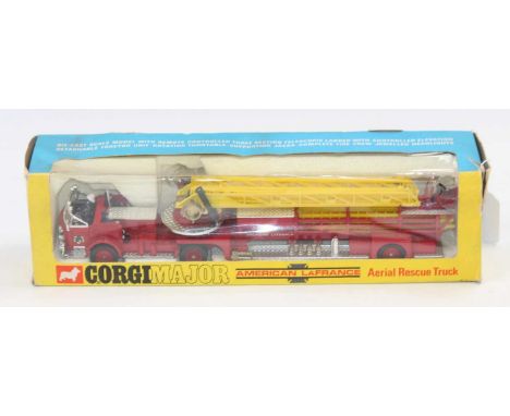 A boxed Corgi Toys 1143 American LaFrance Aerial Rescue Truck 1st edition, The model in red with yellow ladder and chrome pla