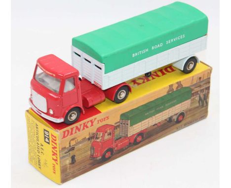 A boxed Dinky Toys 914 A.E.C. Articulated Lorry ‘British Road Services’ red cab, light grey trailer, green plastic tilt, chro