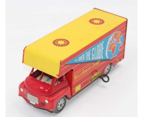 Wells Brimtoy tinplate and clockwork model of an "All Over The Globe" Delivery Van, brightly tinprinted with single fixed key