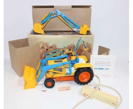 Clim of Spain, tinplate, and plastic battery-operated model of an excavator, finished in yellow, blue, white and orange, with