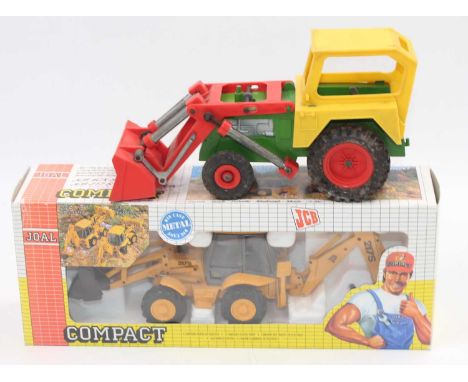 A small group of 2 model tractors as follows: Triang tractor with bucket circa 1960s in yellow/red/green unboxed, plus a boxe
