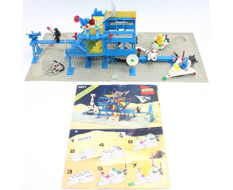 A Lego No. 6971 Intergalactic Command Base Set, built example with instruction leaflet, missing outer box, vendor states comp