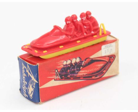 4-Bobsliegh Made in Norway, plastic and weighted model of a Bobsleigh, yellow and red body housed in the original card box, u