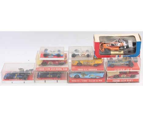 10 various plastic-cased Super Champion of France and John Day Model cars diecast race vehicles, all in original packaging, e