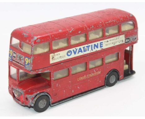 An original vintage Triang Spot-On 1/42 scale diecast model No.145 London Transport Routemaster Bus with red body, cream inte