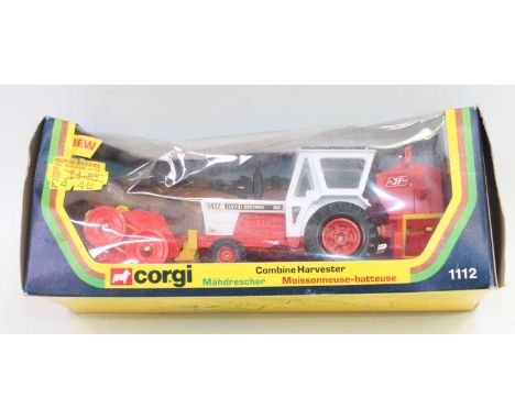 Corgi No.1112 David Brown 1412 Tractor with Combine Attachment, model appears near mint in a good box, cellophane slightly to