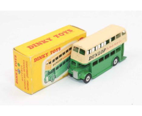 Dinky Toys no.290 Double-deck bus boxed with green body and fitted with the late spun hubs in "Dunlop" livery with correct bo