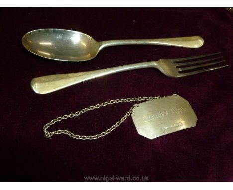 A crested Silver Spoon and fork with a Silver Decanter label "Granny's Tipple"