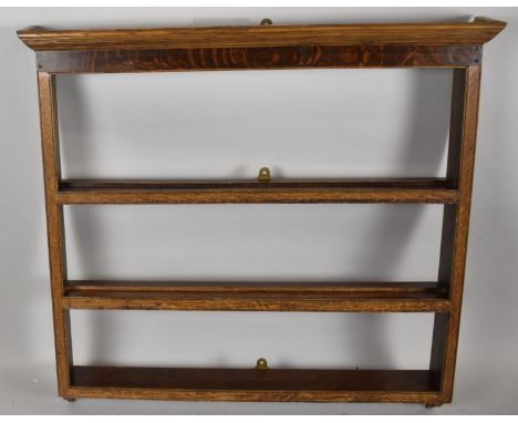 A Vintage Oak Three Shelf Wall Hanging Plate Rack, 102cm wide 