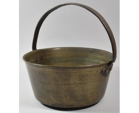 A Vintage Brass Jam Kettle with Iron Loop Handle, 28cm Diameter 