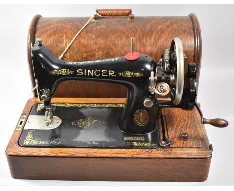 An Oak Cased Manual Singer Sewing Machine F7166281 