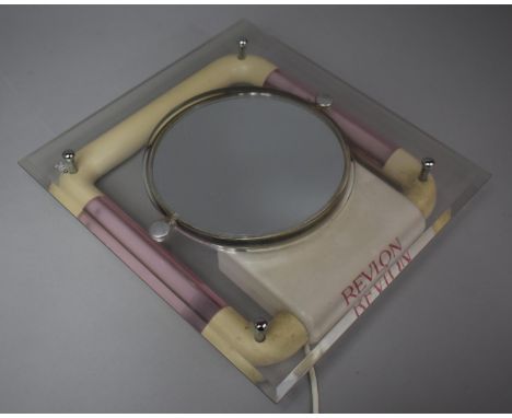 An Illuminated Vintage Revlon Makeup Mirror 