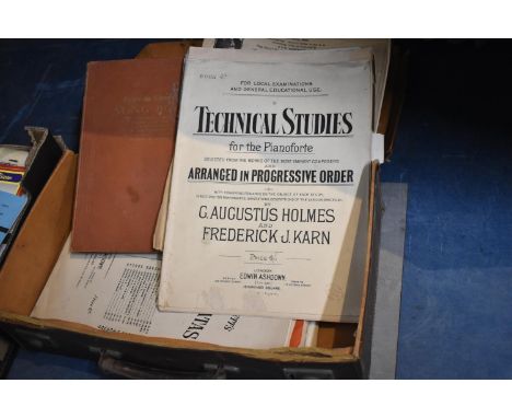 A Vintage Leather Case Containing Sheet Music 