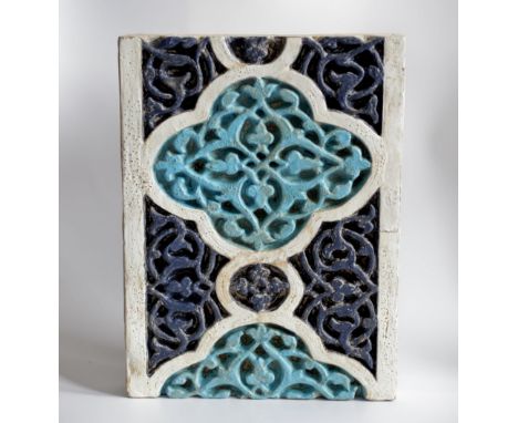 A RARE LATE 14TH / EARLY 15TH CENTURY ISLAMIC TIMURID CARVED POTTERY TILE, The tile of rectangular form with white borders, t