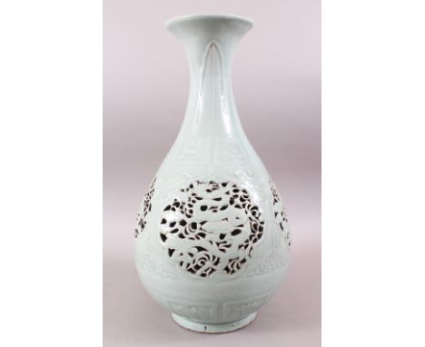 A GOOD CHINESE CLAIR DE LUNE PIERCED PORCELAIN VASE, the body with reticulated panels of dragons, further decorated with form